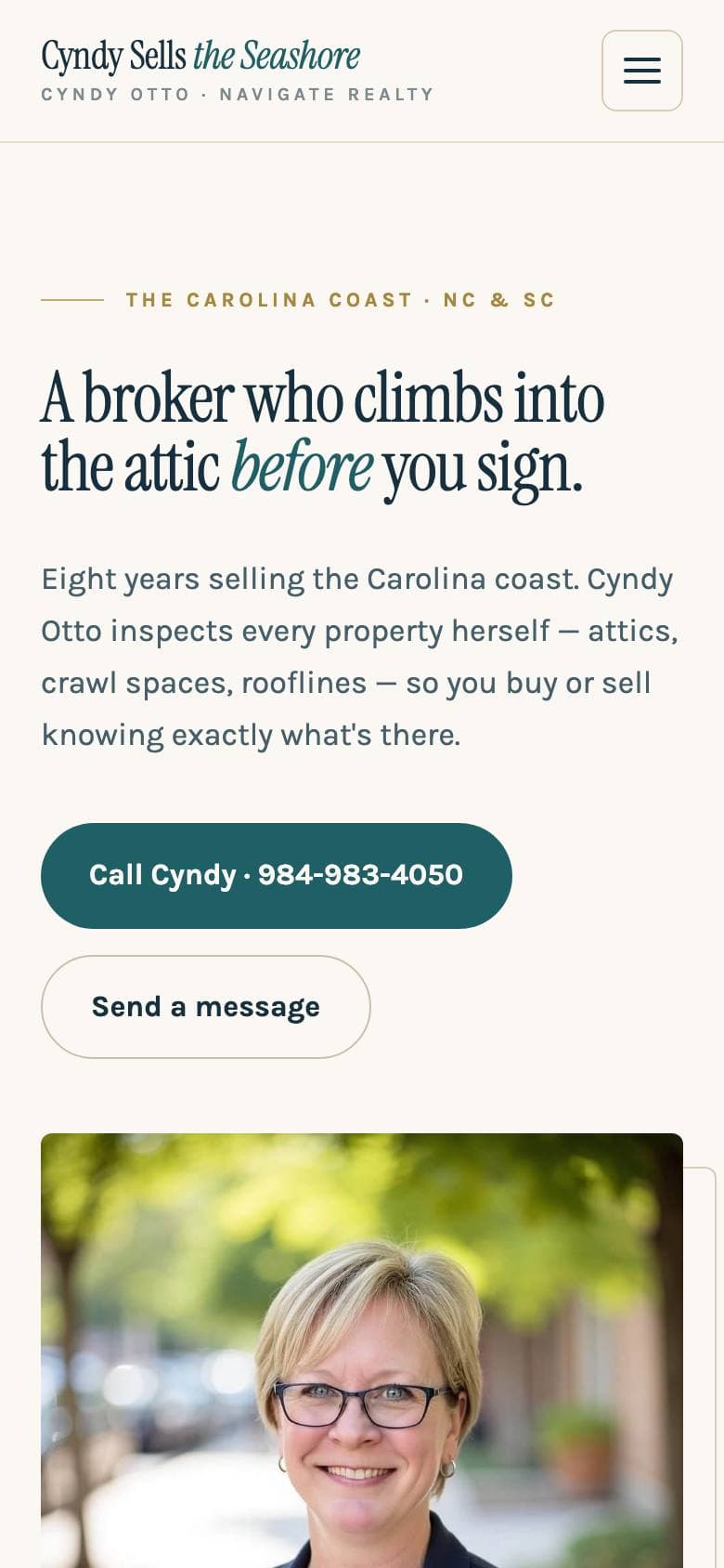 Cyndy Otto Real Estate on a phone